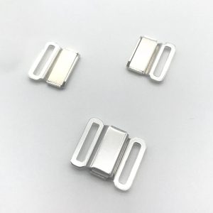 Upgrade your collection with our premium Alloy Front Closure Buckle. This versatile piece combines fashion and function, offering an adjustable, secure closure perfect for high-end swimwear and lingerie. Its durable, corrosion-resistant construction ensures product longevity, while the sleek silver finish provides a universally appealing aesthetic. An excellent choice for brands looking to add value and a custom-fit feature to their designs.